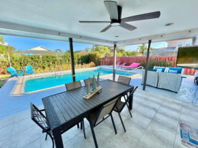 Aqua Blue! Only 1 Mile to the Beach! Heated Pool, Fenced in Yard & Pet Friendly!